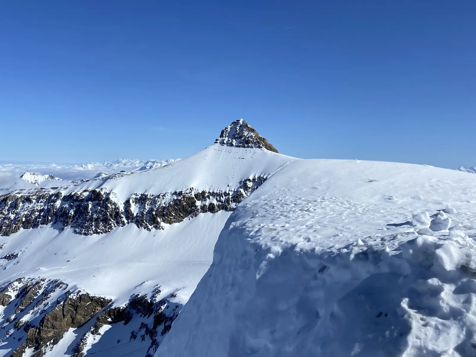 Snow Capped Peaks Of The Diablerets Massif Rising Above A Sea Of Clouds At Glacier 3000 Near Gstaad