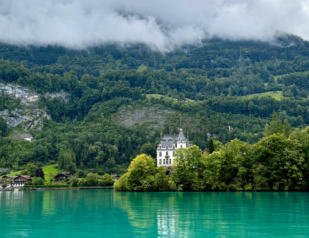 Historic Seeburg Castle On The Peninsula Of Iseltwald Lake Brienz